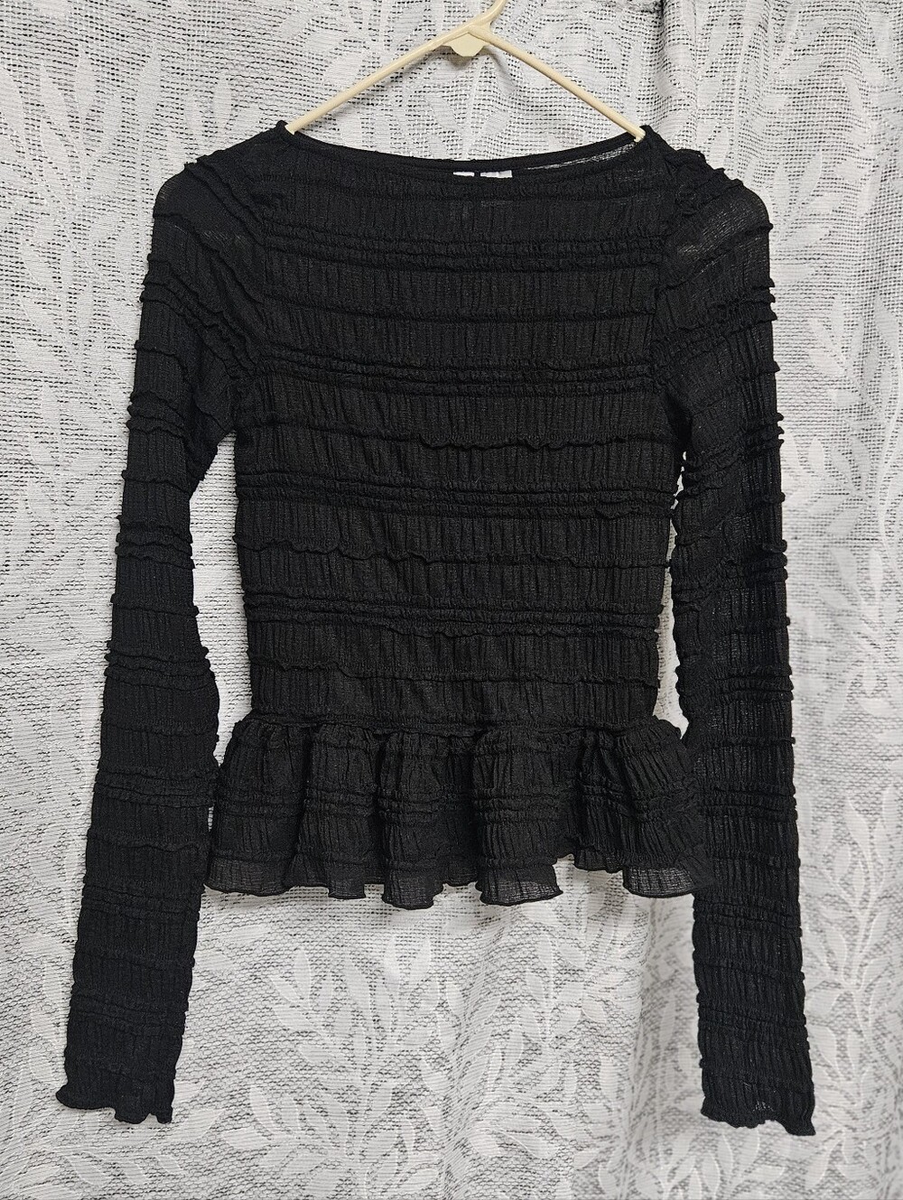 Divided Black Long-Sleeve Ruffle Peplum Top